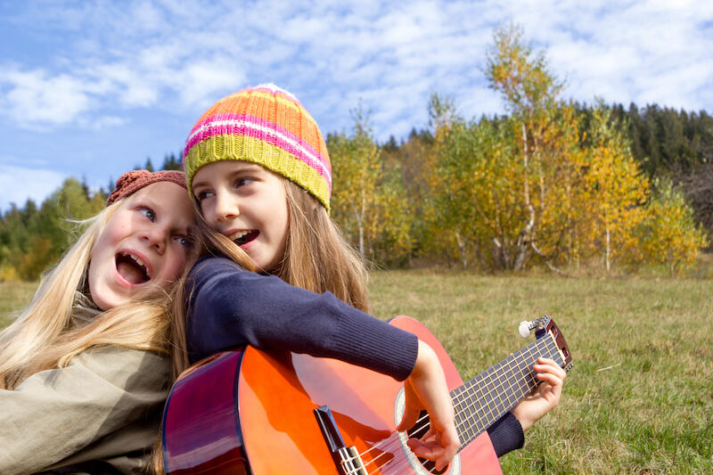 Girls playing guitar
